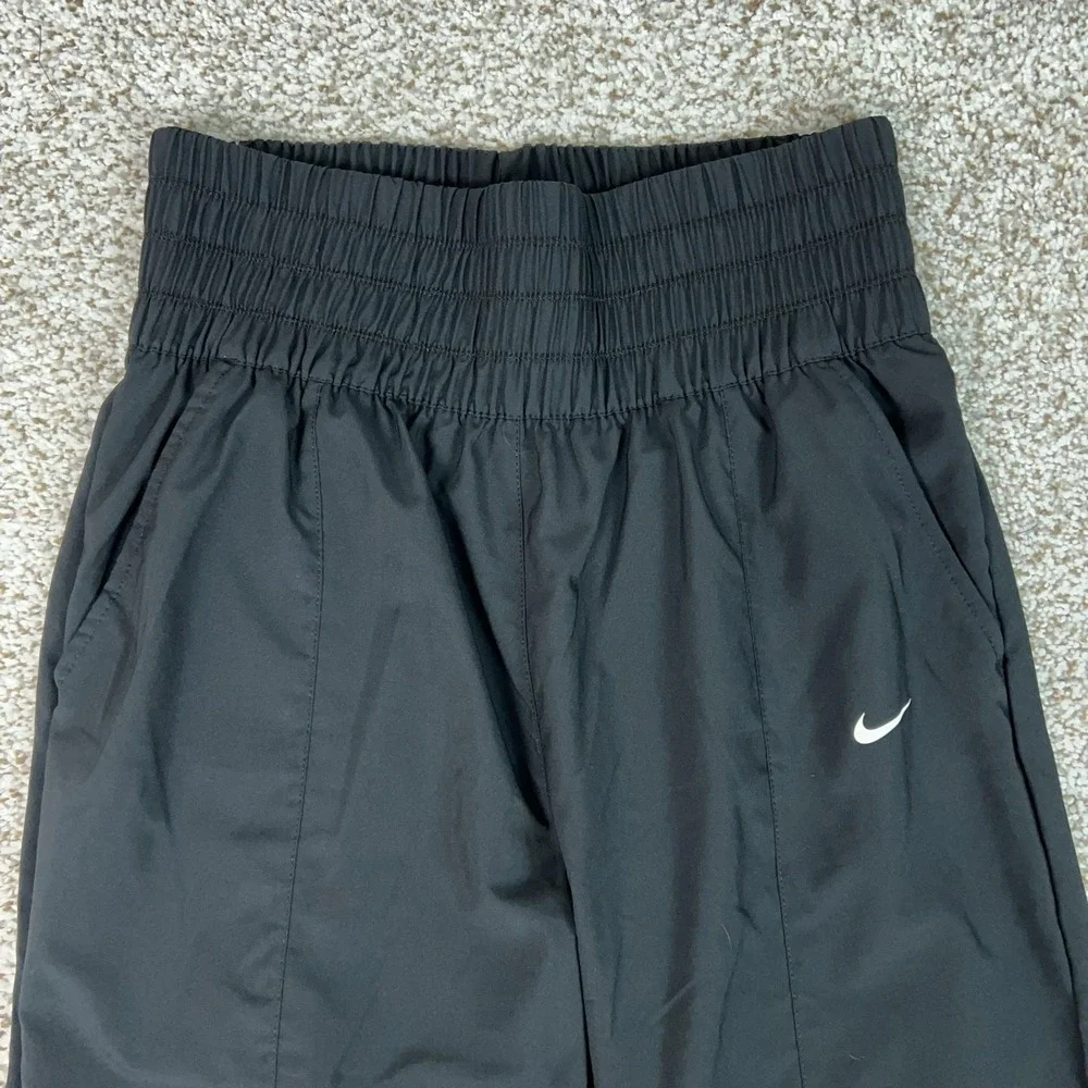 Nike Pants Womens M Black Dri FIT Track Relaxed Ultra High Waisted Running Gym
